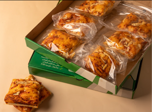 بوكس المدرسة  ( ٨ قطع  ساوردو زعتر + ٨ قطع ساوردو بيتزا + ٩ حبات كب كيك المجدول العضوي )