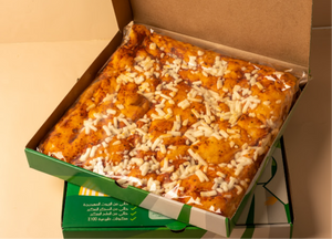 بوكس العائلة ( بيتزا الساوردو العائلية الحجم الكبير + فطيرة ساوردو الزعتر الحجم العائلي ) بالخميرة الطبيعية ، خالية من السكر والزيوت المهدرجة