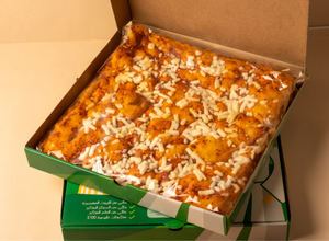 بوكس العائلة ( بيتزا الساوردو العائلية الحجم الكبير + فطيرة ساوردو الزعتر الحجم العائلي ) بالخميرة الطبيعية ، خالية من السكر والزيوت المهدرجة