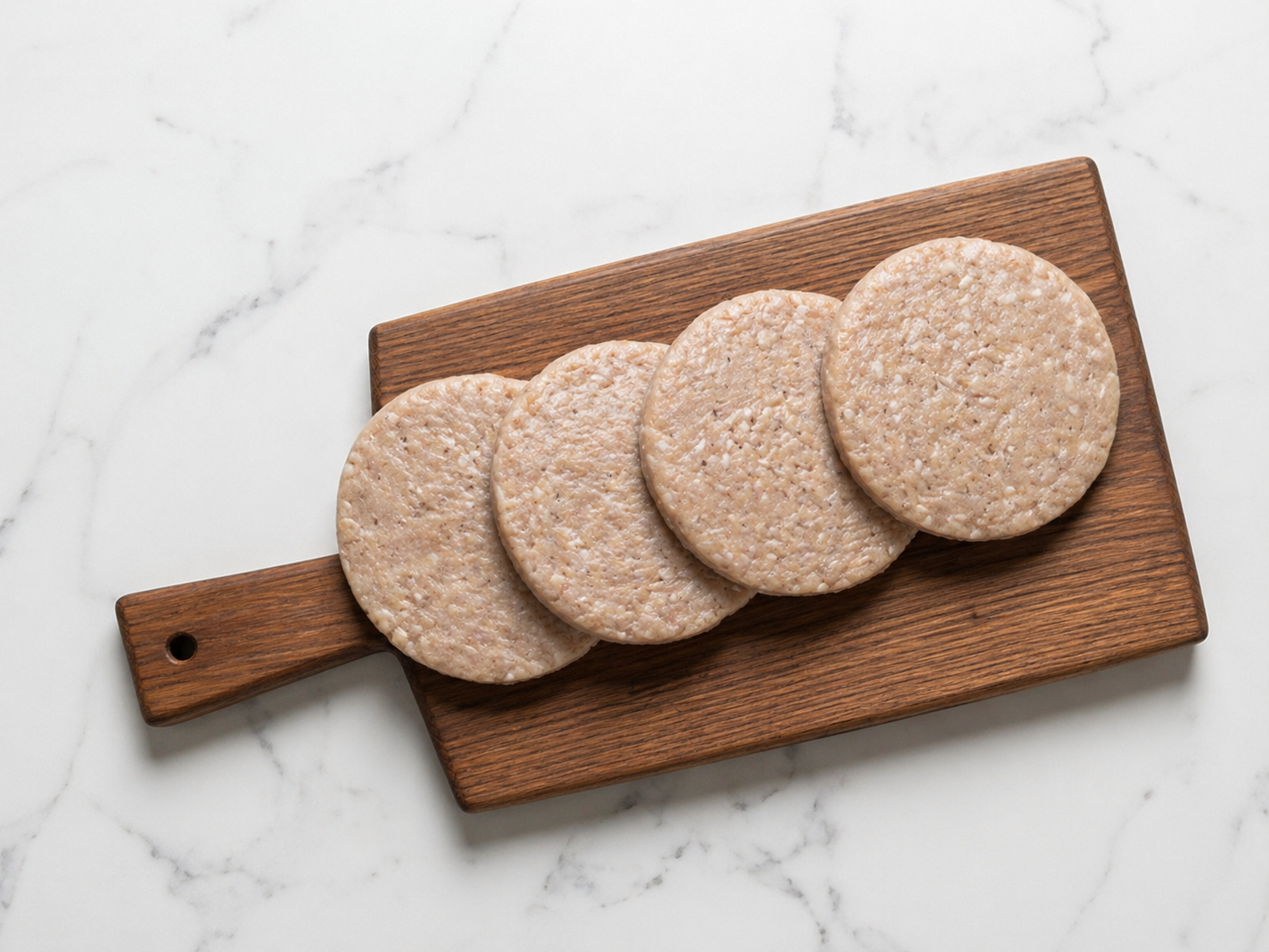 برجر الدجاج ٥٠٠ غرام طازج ( ٤ قطع كل قطعه ١٢٥ غرام )