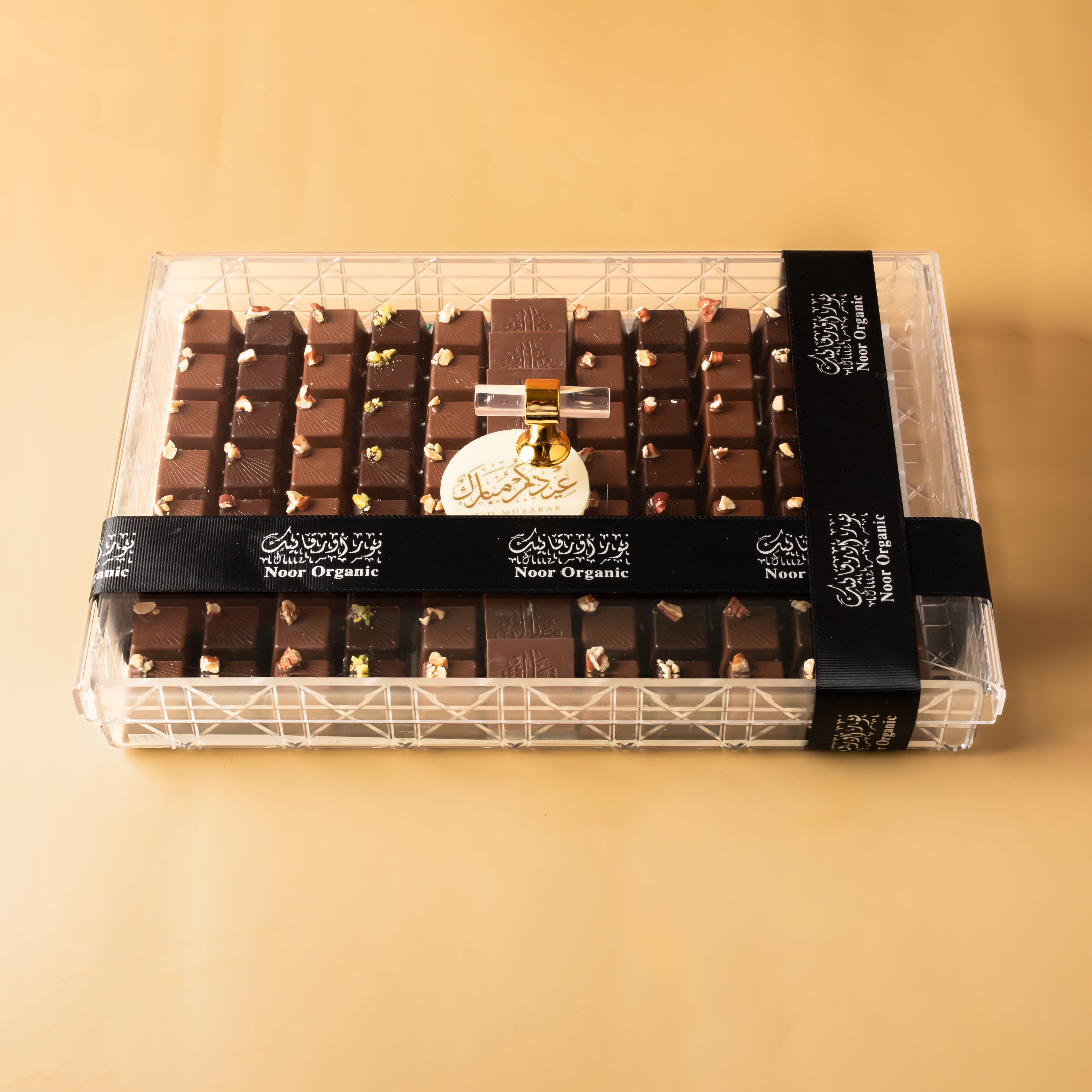 صينية فاخرة من الدارك چوكلت ٥٨٪؜ بحشوات مختلفة ١ كيلو و ١٠٠ غرام